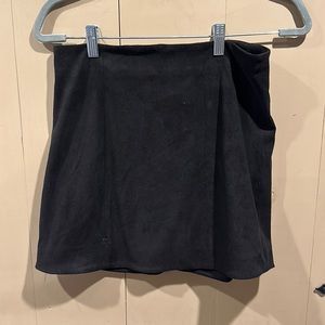 Black velvet skirt, zipper on back.